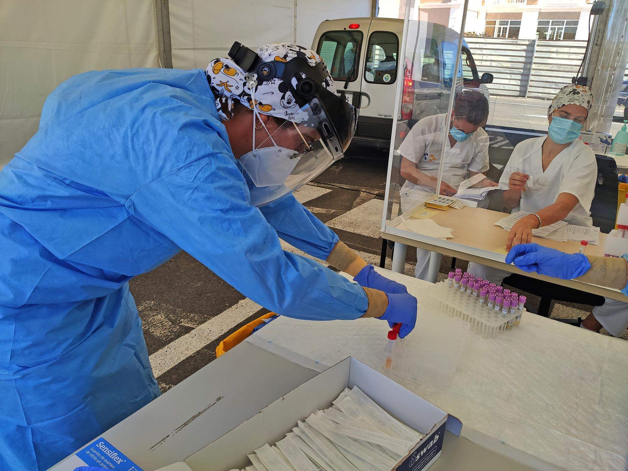 Toma de muestras en el auto covid Toma de muestras en el auto covid