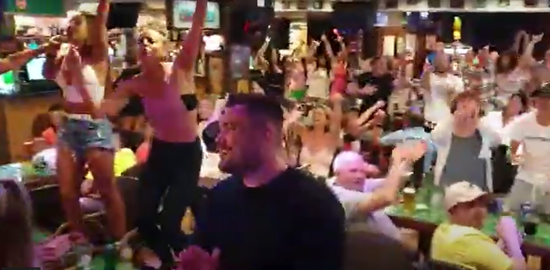 Tourists partying in a bar in Puerto del Carmen