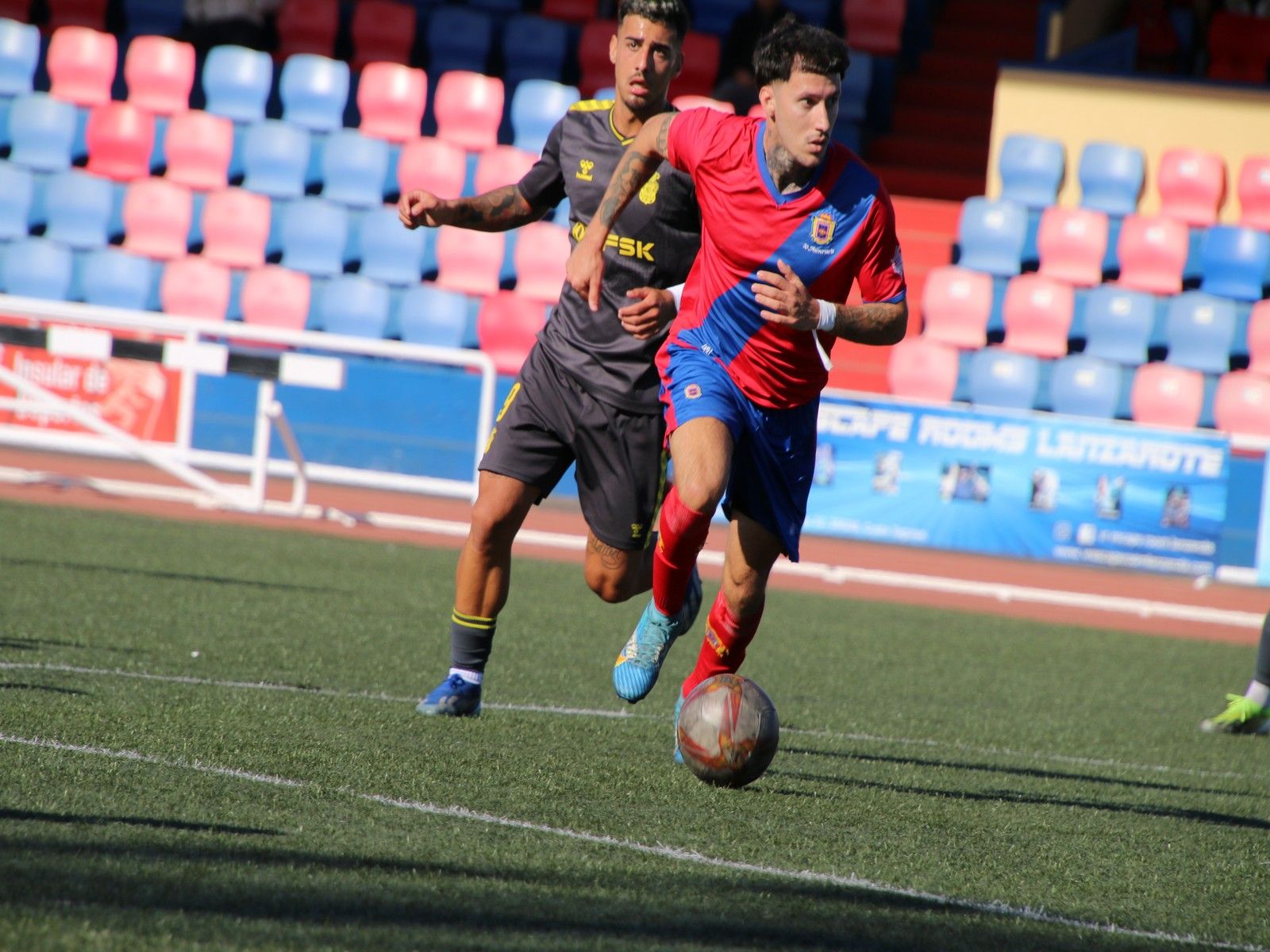 Partido entre el Lanzarote B y UD Las Palmas Atlético