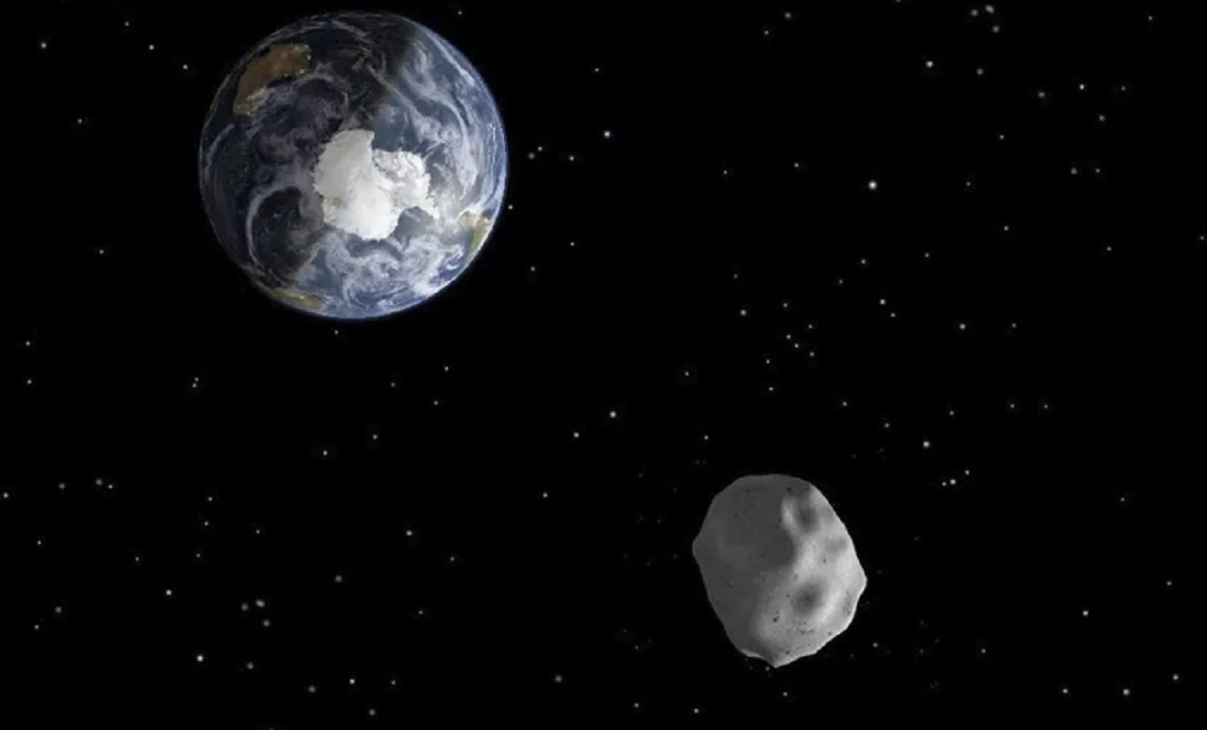 Recreación que representa el paso del asteroide 2012 DA14 a través del sistema Tierra Luna, en una imagen de archivo. EFE/Nasa/Jpl-Caltech.