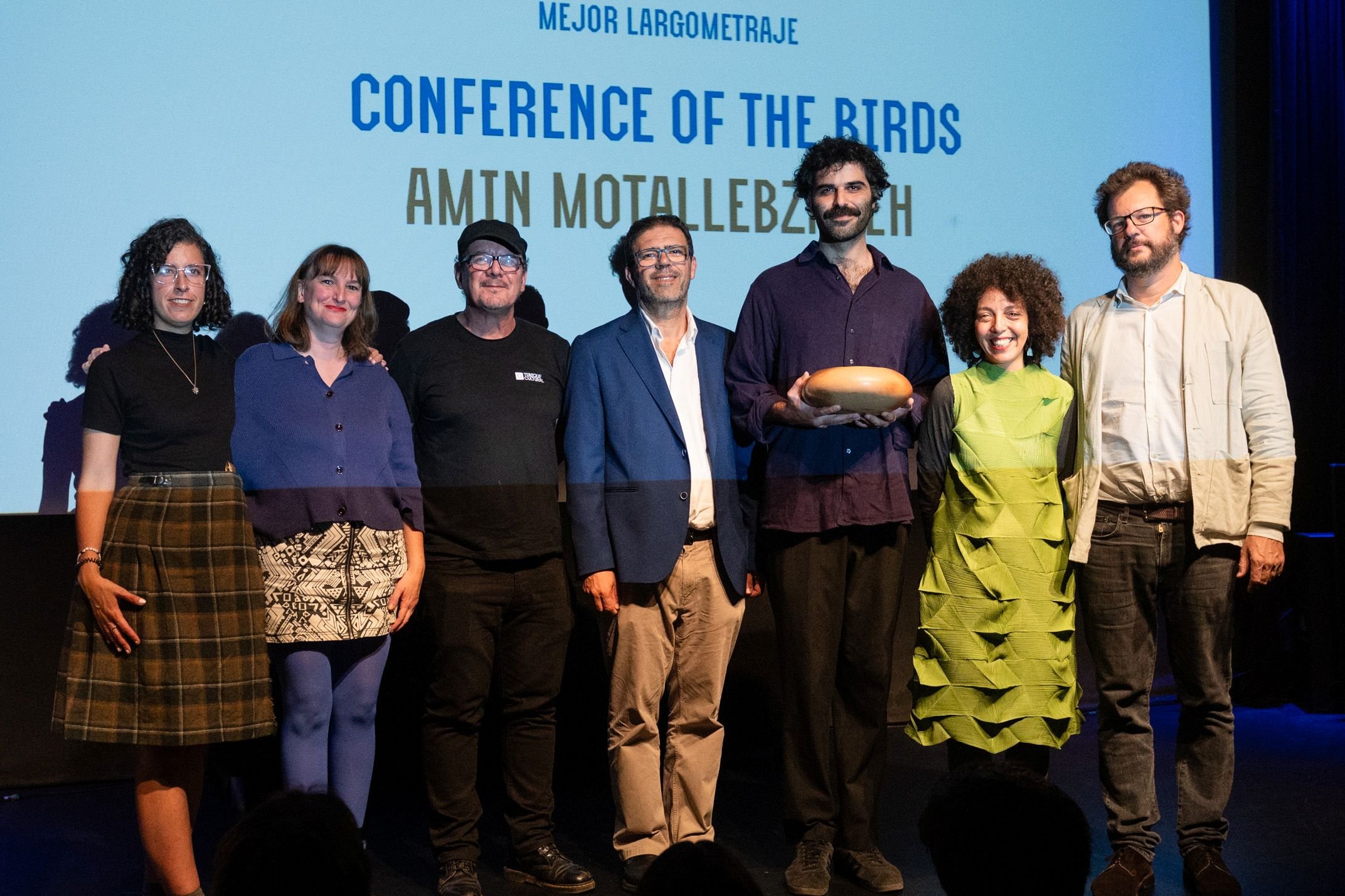 Lucía Salas (jurado) Violeta Kovacsics(jurado) Buski Cuberlo (cofundador de la Muestra) Antonio Martín (jurado) Amin Motallebzadeh (ganador), Elena Azzedín (programa educativo y traductora) Javier Fuentes Feo (director Muestra)