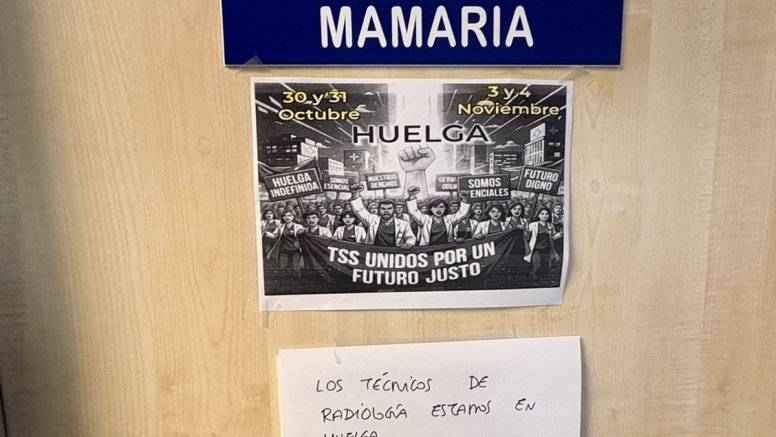 Papel que informa de la huelga en la sala donde se realizan pruebas médicas