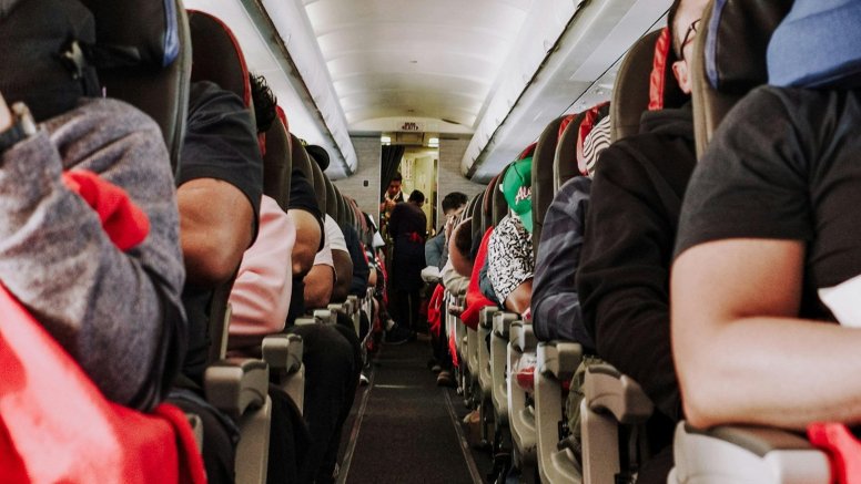 Pasajeros en un avión. Vuelos.
