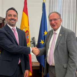 Francisco Manuel Fajardo y Manuel Olmedo en la reunión
