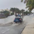 Calle anegada de agua tras la lluvia caída en una imagen de archivo.